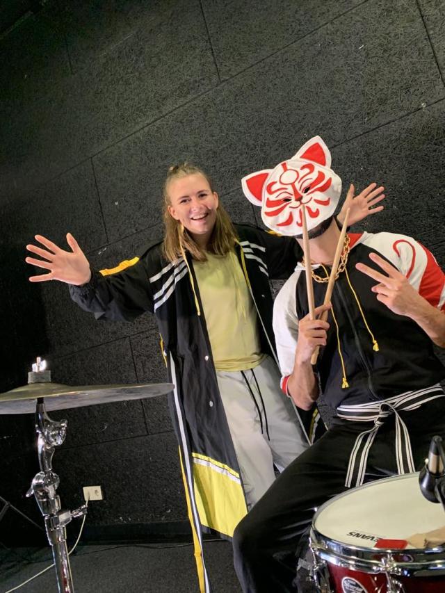 a girl and a boy in masks